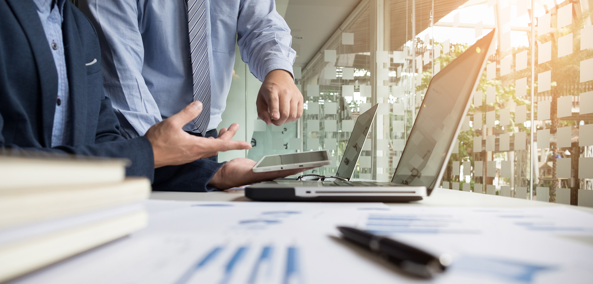 Business adviser analyzing financial figures denoting the progress in the work of the company.